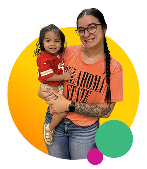 young woman holding a baby in her arms